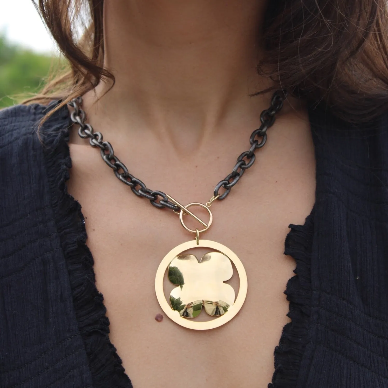 MILEY FLORAL STATEMENT DISC PENDANT NECKLACE